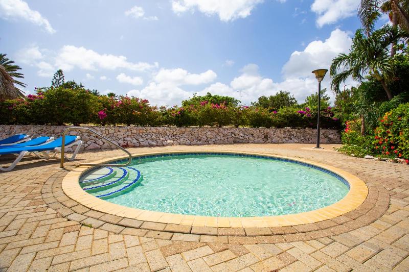 Studio at the pool in tropical Resort Seru Coral with privacy and large pool - image 5