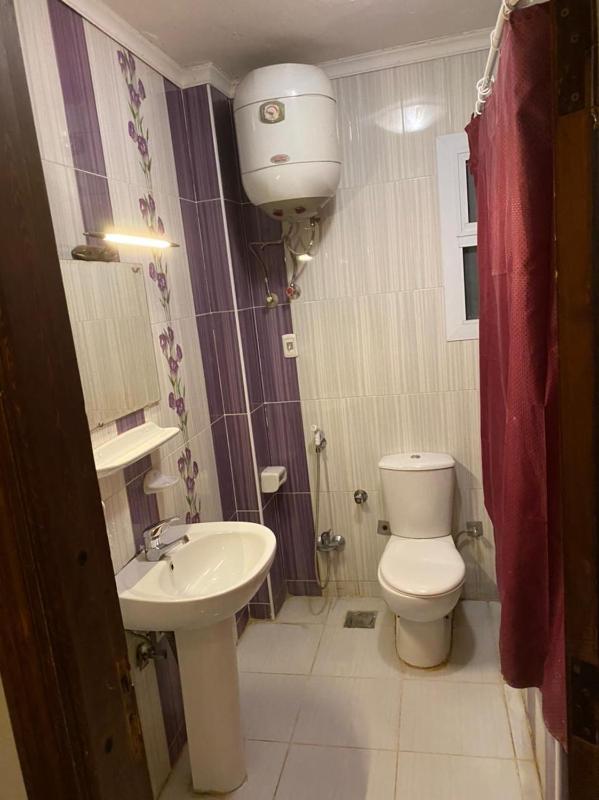 Standard Triple Room with Private Bathroom image 2