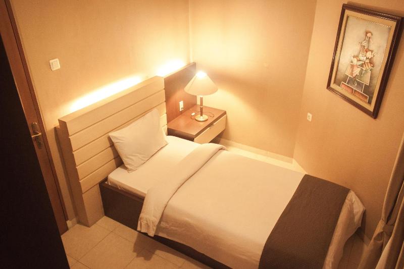 Travellers Suites Serviced Apartments - image 3