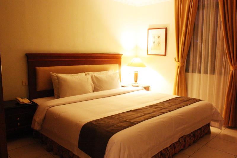 Travellers Suites Serviced Apartments - image 27
