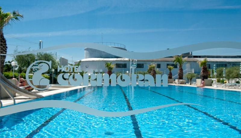Family Room with Balcony and Pool View image 2