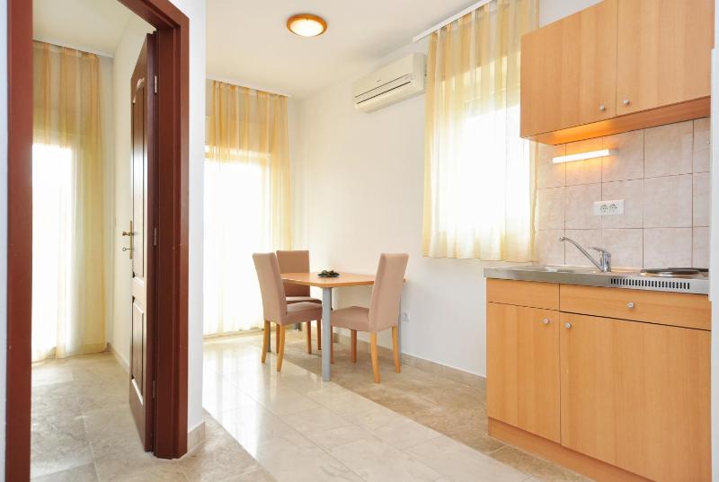 Comfort One-Bedroom Apartment with with Balcony and City View image 2