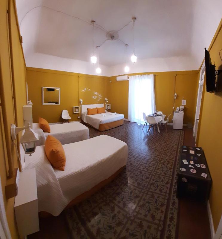 Quadruple Room with Private Bathroom image 1