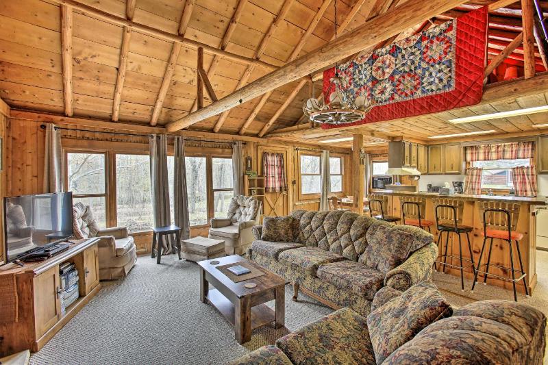 Rustic River View Cabin with Fire Pit, Games and Grill Images
