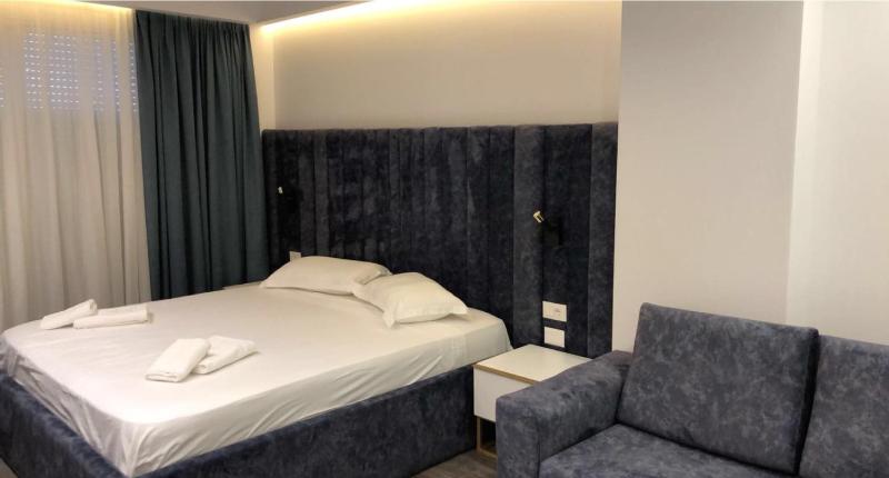 Deluxe Quadruple Room image 1
