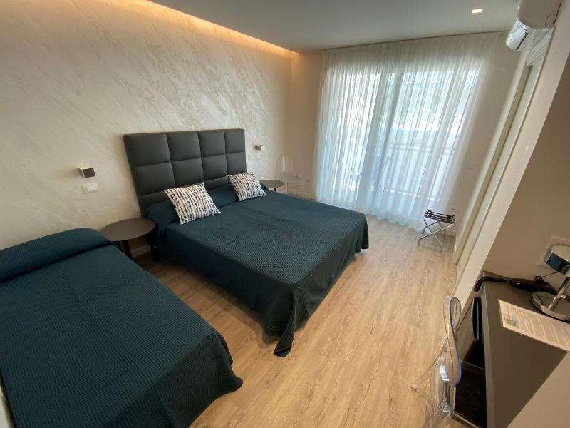 Deluxe Triple Room with Side Sea View image 1