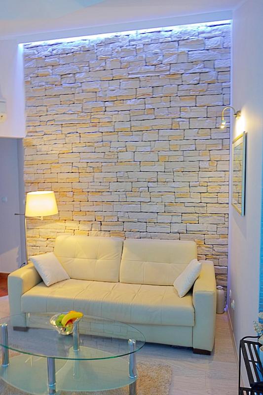 One-Bedroom Apartment with Balcony and Side Sea View image 3