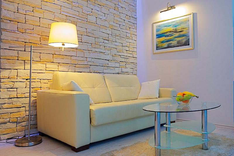One-Bedroom Apartment with Balcony and Side Sea View image 2