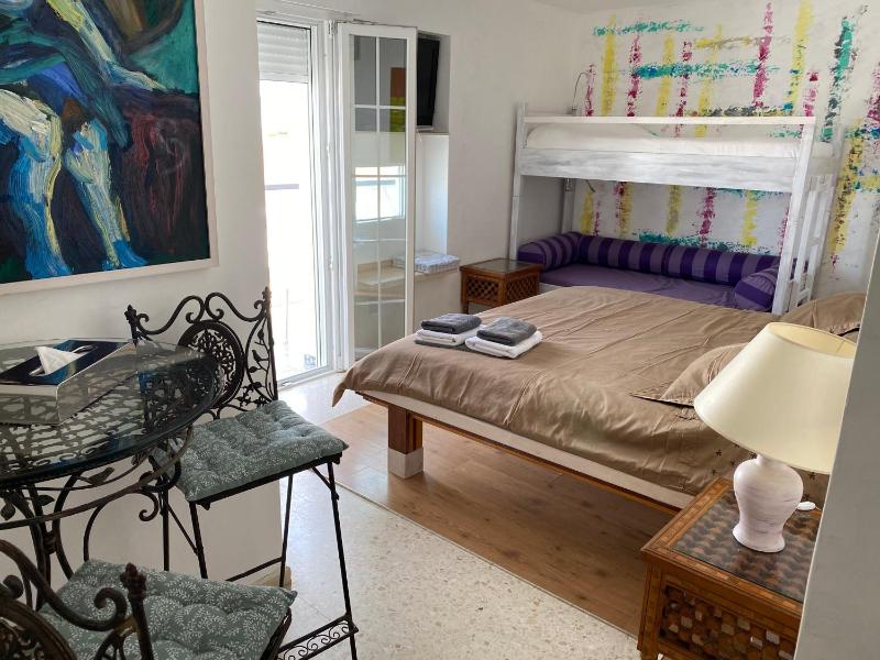 Quadruple Room with Balcony image 1