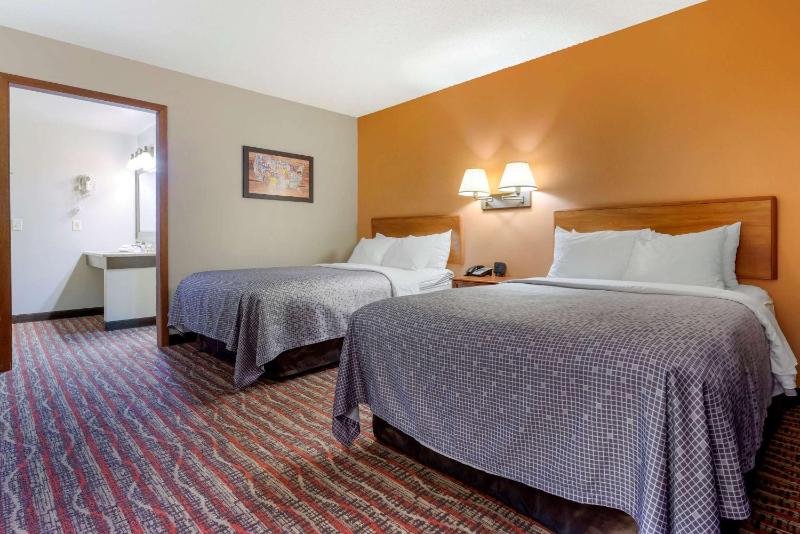 Quadruple Room with Two Double Beds and Balcony - Non-Smoking image 2