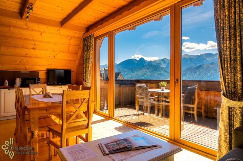 Panoramic Three-Bedroom Apartment with Balcony, Fireplace and Mountain view image 1