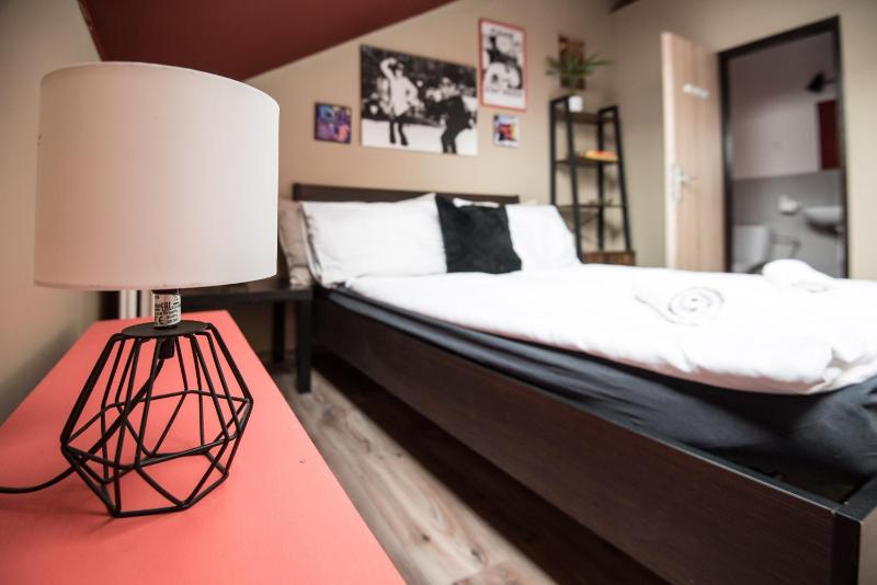 Quadruple Room with Private Bathroom image 1