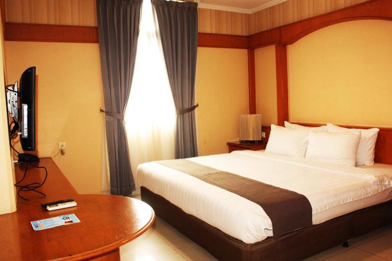 Travellers Suites Serviced Apartments - image 16