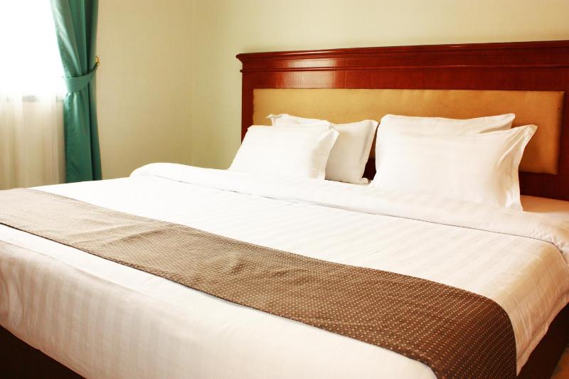Travellers Suites Serviced Apartments - image 12