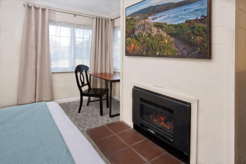 Two Queen Beds with Fireplace image 3