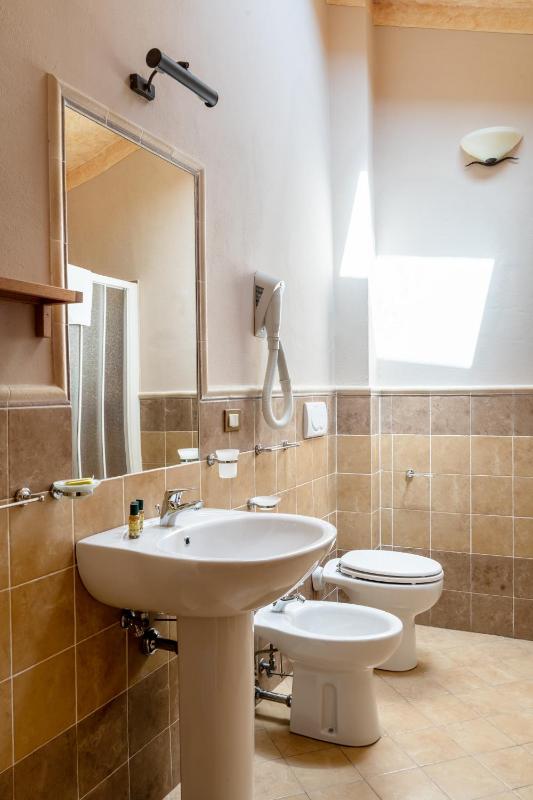 Quadruple Room with Private Bathroom image 1