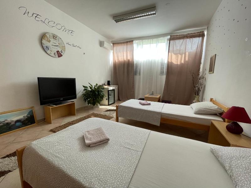 Quadruple Room with Private Bathroom image 1