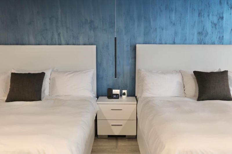 Deluxe Queen Suite with Two Queen Beds, Non-Smoking image 1