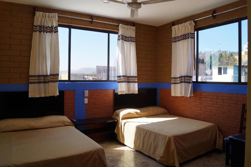 Deluxe Queen Room with Two Queen Beds image 1