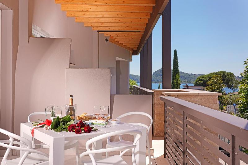 Apartment with Balcony and Partial Lake View image 1