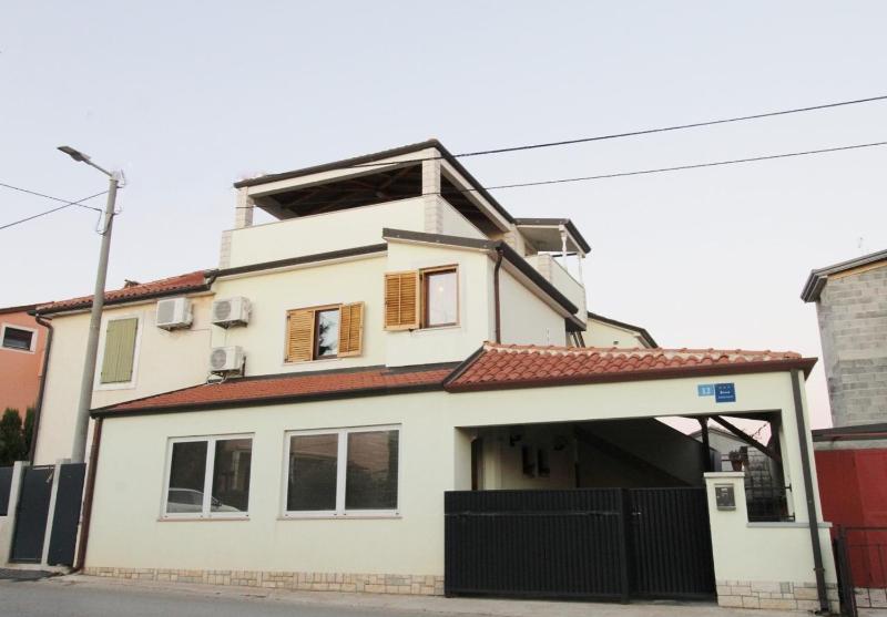 Apartments Zambratija with sea view Images