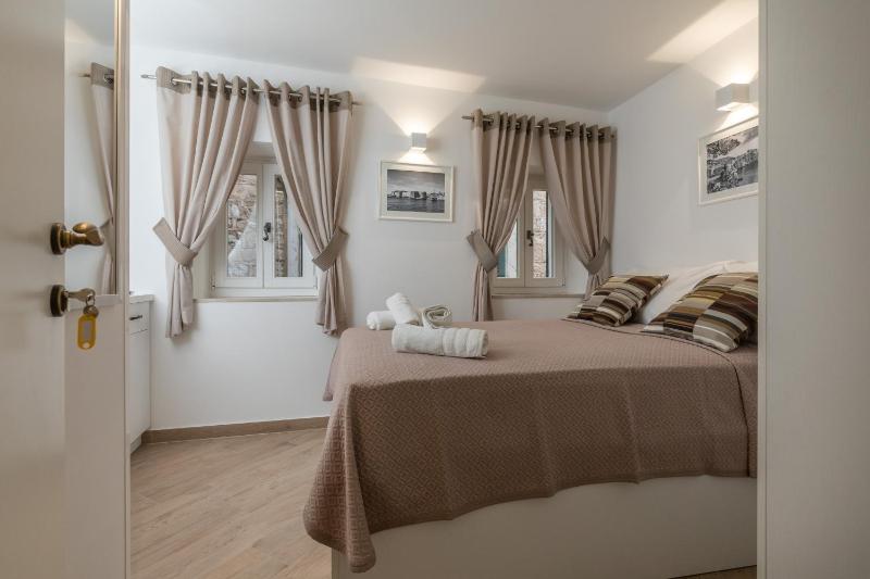 Duplex One-Bedroom Apartment with Terrace and City View image 1