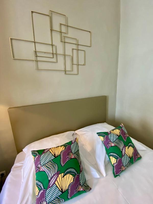 Basic Quadruple Room with Shared Bathroom image 1