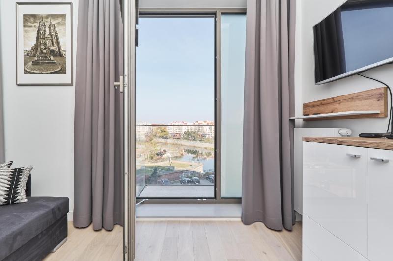 Eleganckie Studia Wyspa Słodowa by Noclegi Renters - image 11