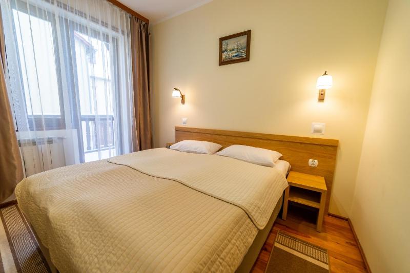 Double Room with Balcony and Side Lake View image 1
