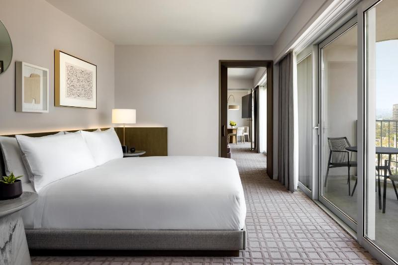 Signature One Bedroom Corner King Suite with Three Balconies and Sofabed