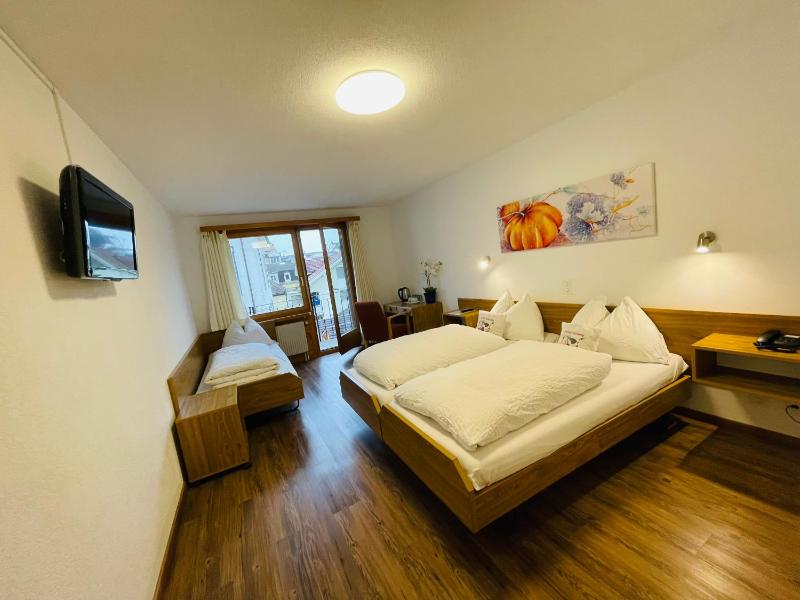 Standard Triple Room with Balcony image 1