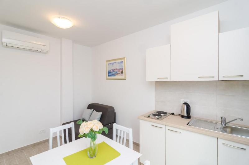 Comfort One-Bedroom Apartment with Balcony and Sea View image 3