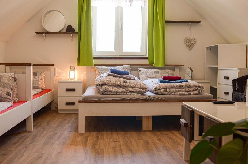 Quadruple Room with Private Bathroom image 2
