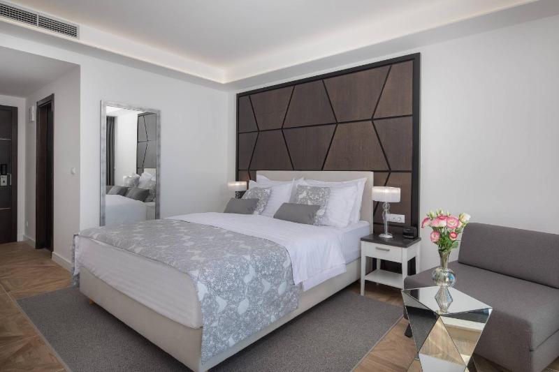 Adria King Bed Room at Pool Side image 1