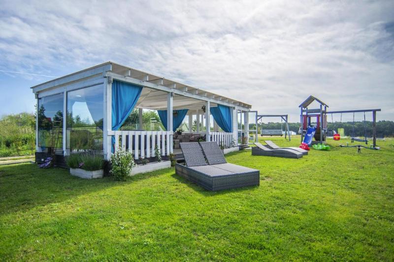 Air-conditioned holiday homes summer pool Rewal - image 1