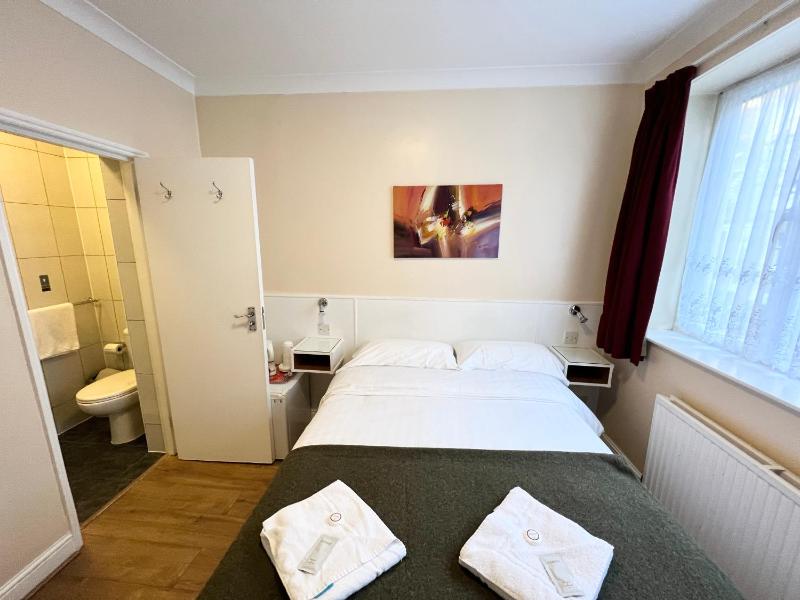 Quad Room with Private Bathroom image 4