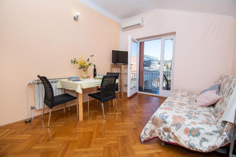 Apartments and Room Agiss with pool - image 9