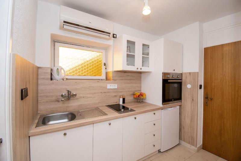Apartments and Room Agiss with pool - image 31