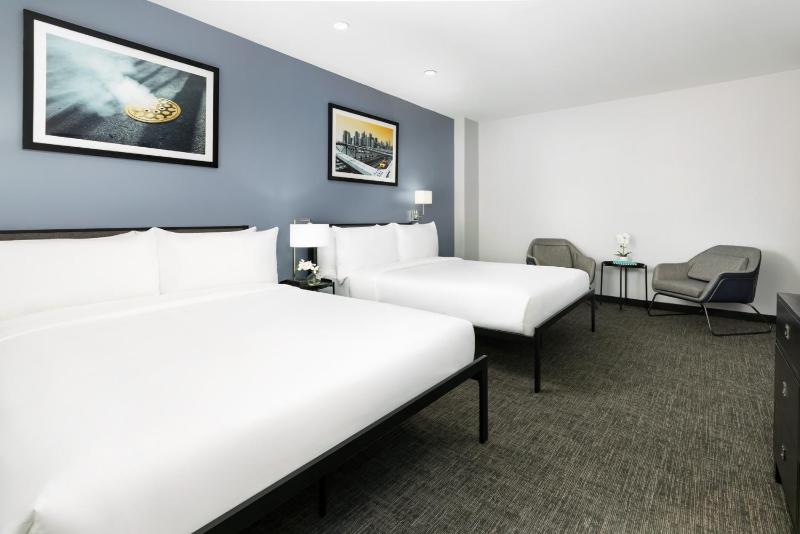 Deluxe Queen Room with Two Queen Beds image 3