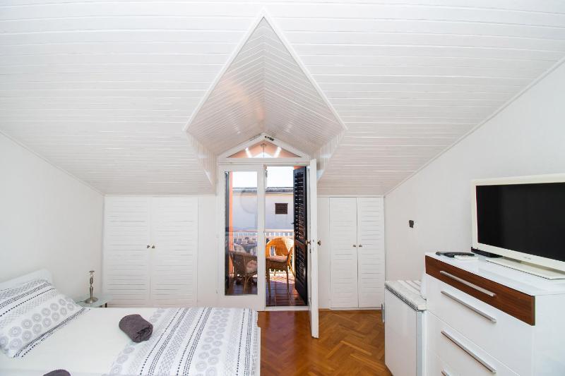 Apartments and Room Agiss with pool - image 39