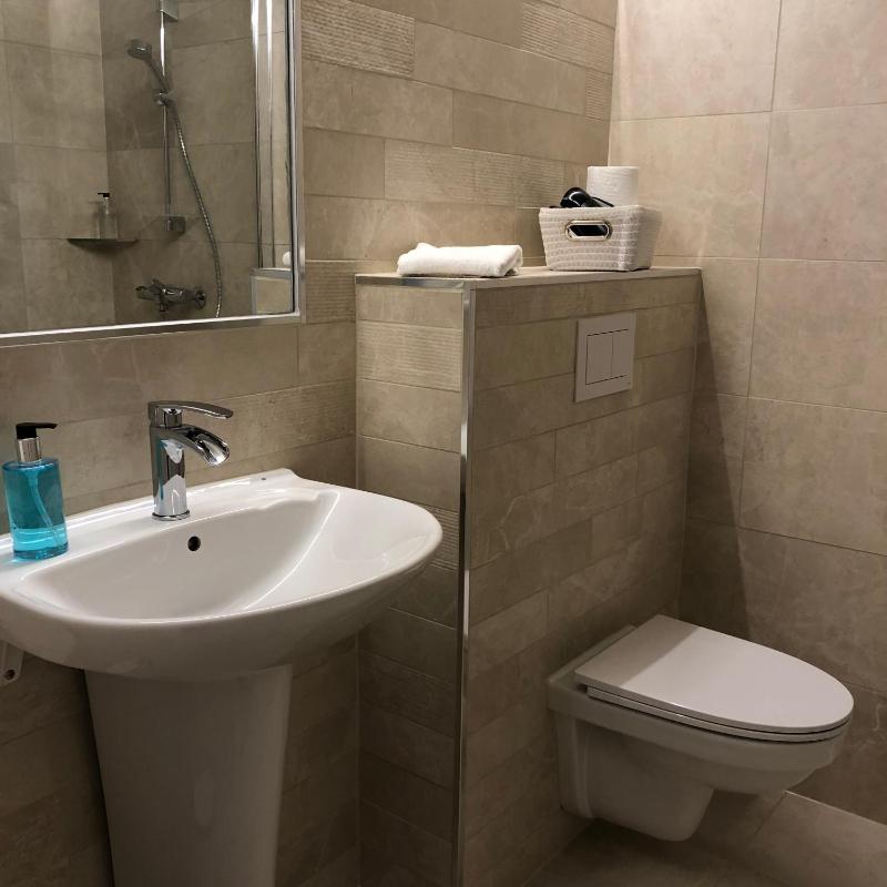 Basic Triple Room with Shared Bathroom image 1