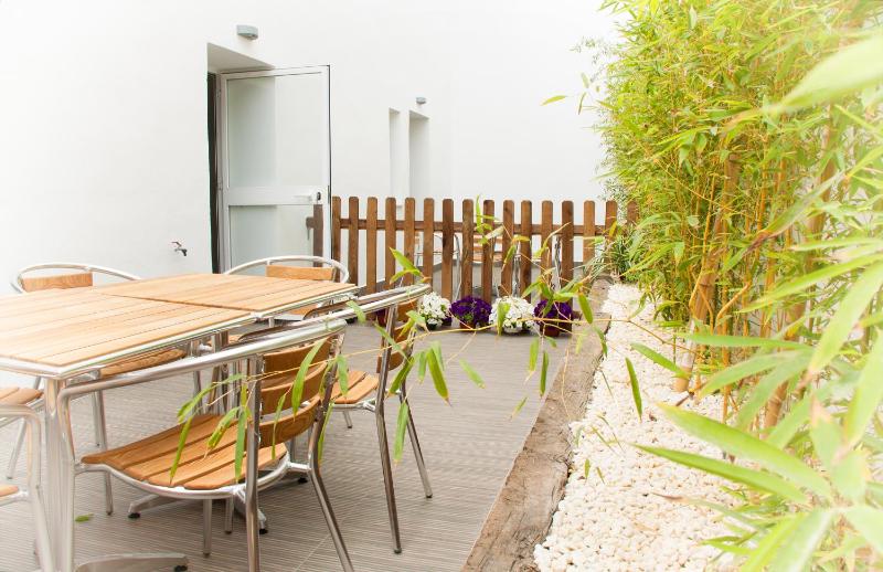 Quadruple  Family Room Patio image 3