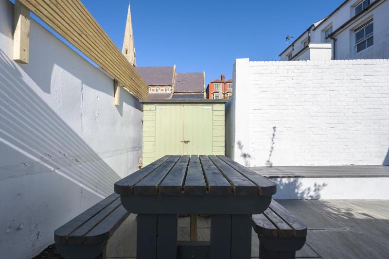 Vibrant Spring Street with Garden - image 14