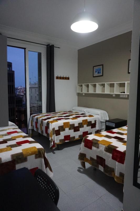 Quadruple Room with Balcony image 3