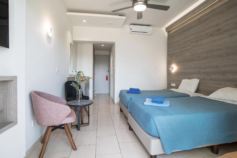 Double or Twin Room with Side Sea View image 1