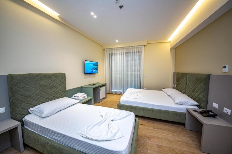 Quadruple Room with Balcony and Side Sea View image 2