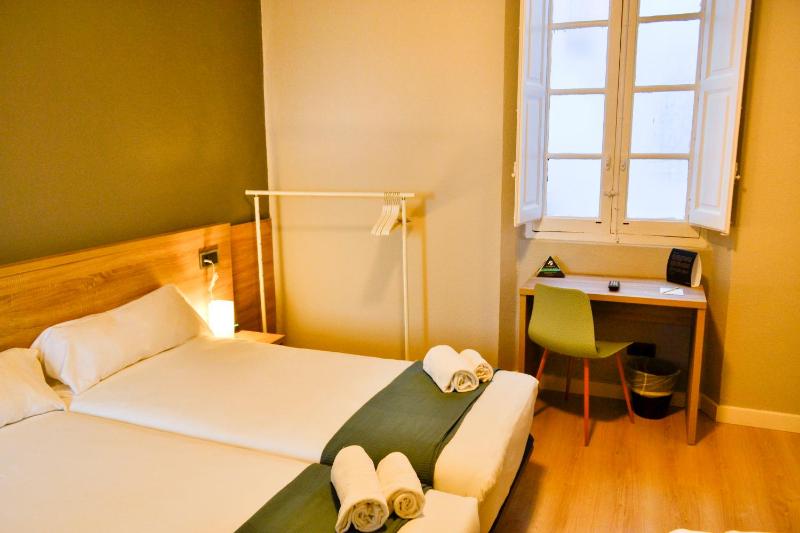 Quadruple Room with Private Bathroom image 1