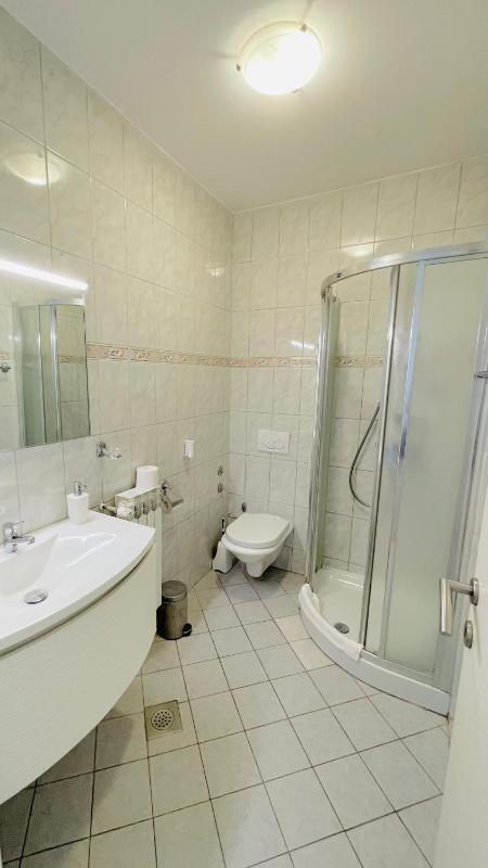 Two-Bedroom Apartment with Balcony and Partial Sea View image 1