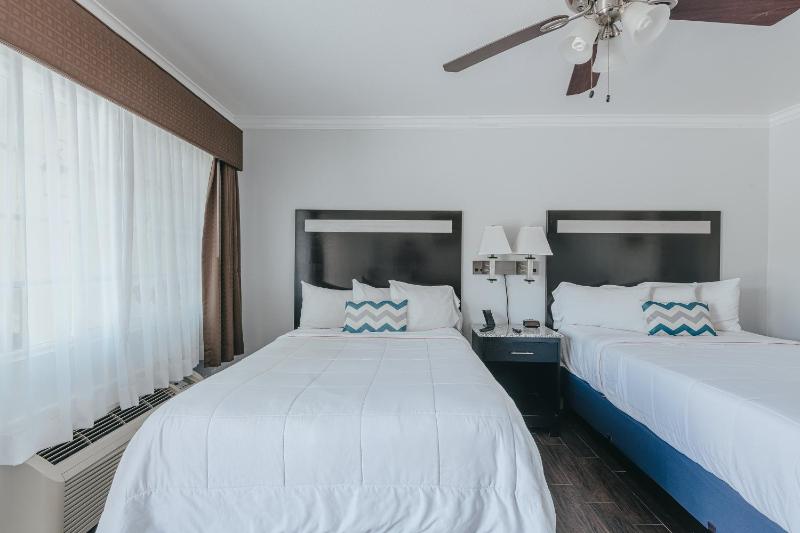 Deluxe Two Double Bed Room - Downstairs, Non-Smoking, No Pets image 4