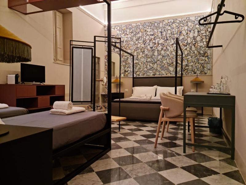 Deluxe Quadruple Room image 1